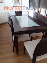 Dining table with 8 chairs plus buffee with drawers.